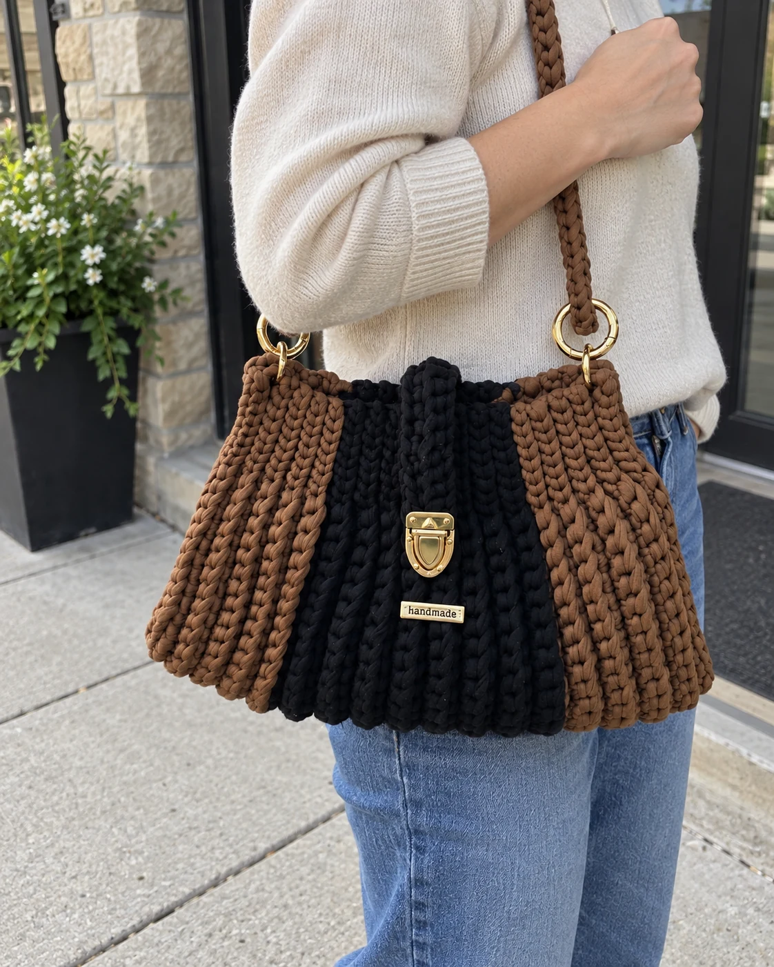 Photo of Chocolate and black handbag