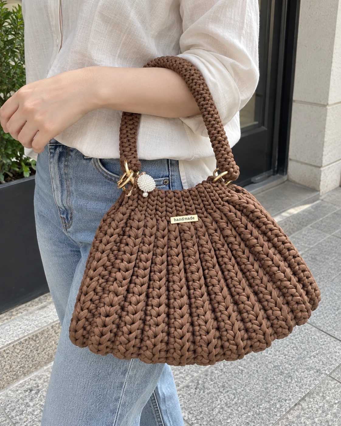 Photo of Cocoa rounded handbag