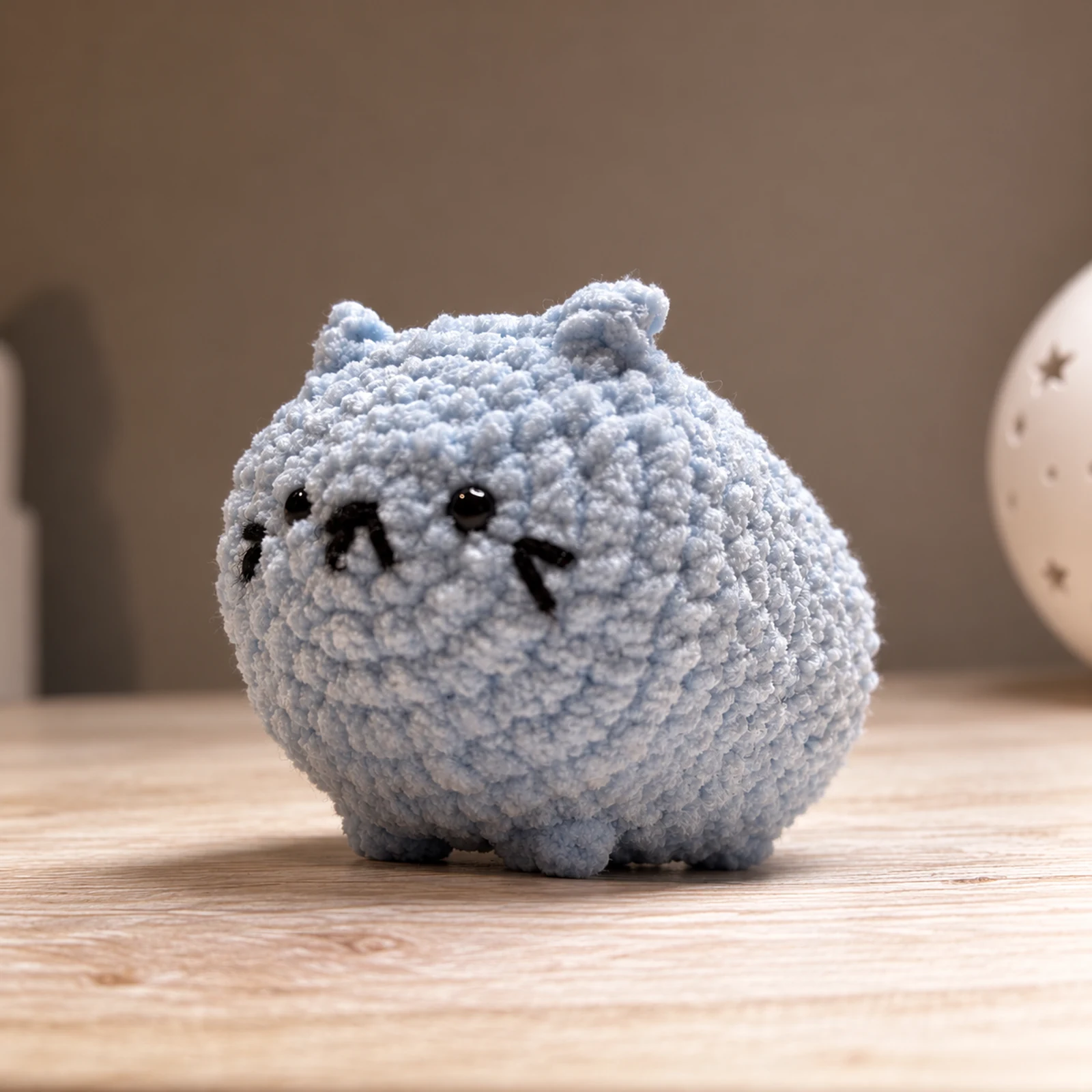 Photo of Blue-gray fuzzy cat plush