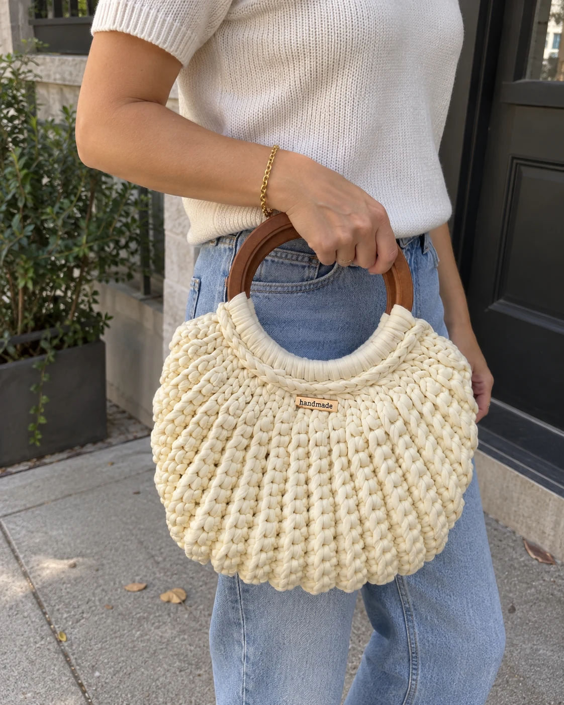 Photo of Ivory curved-handle handbag